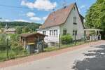 Vielseitiges Zweifamilienhaus mit Ausblick und Garten - Mehrfamilienhaus, Wohnhaus Weilrod | Angebot:21142457